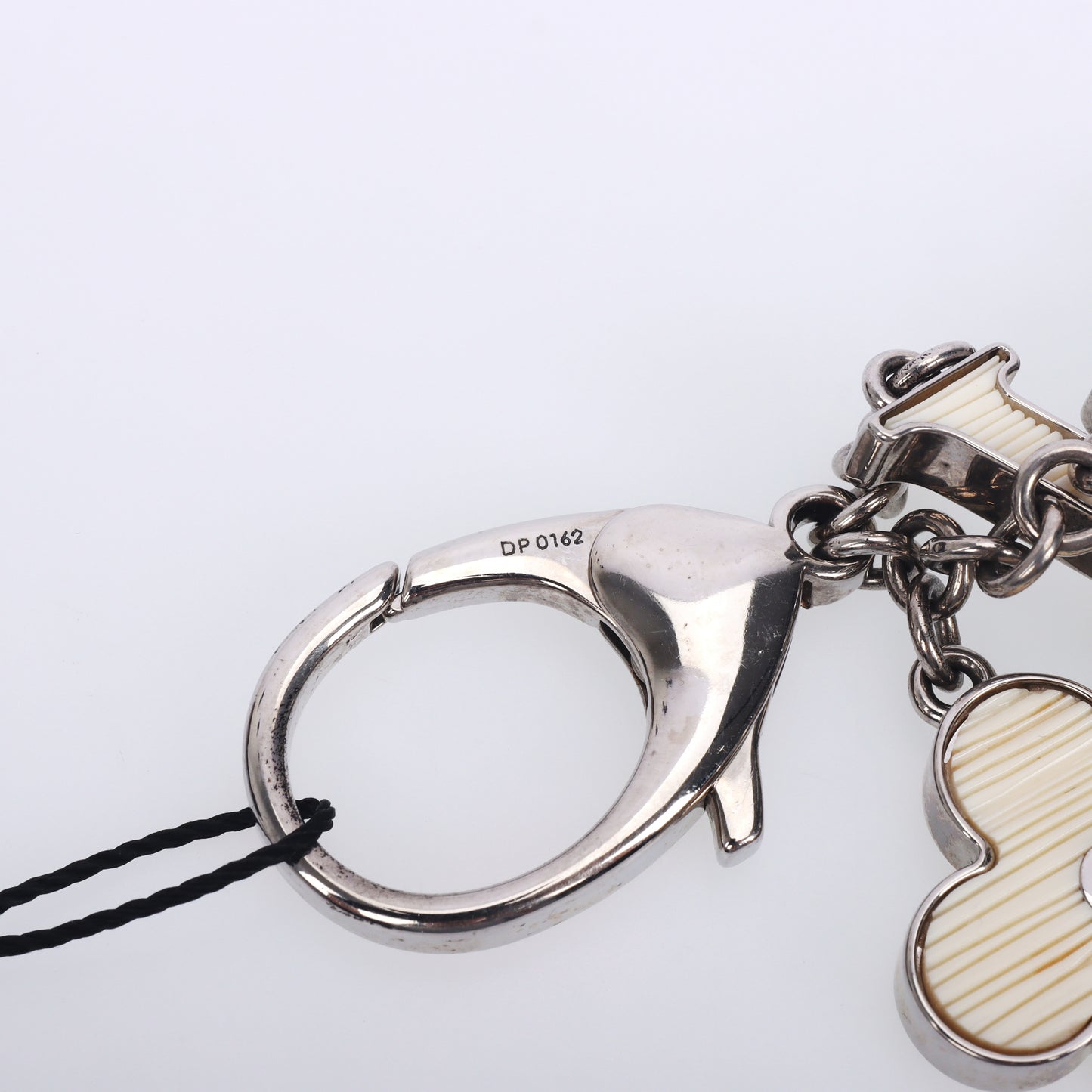 Pre-Owned Louis Vuitton Monogram Flower Silver Metal Bag Charm 12615515