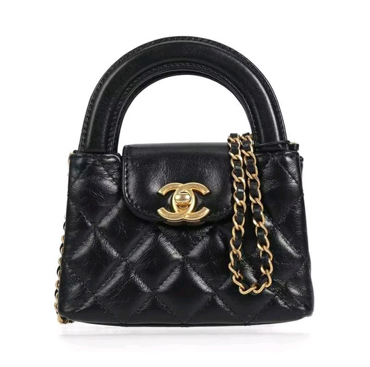 Pre-owned CHANEL Leather Top handle bags Kelly Black Quilted 83410730