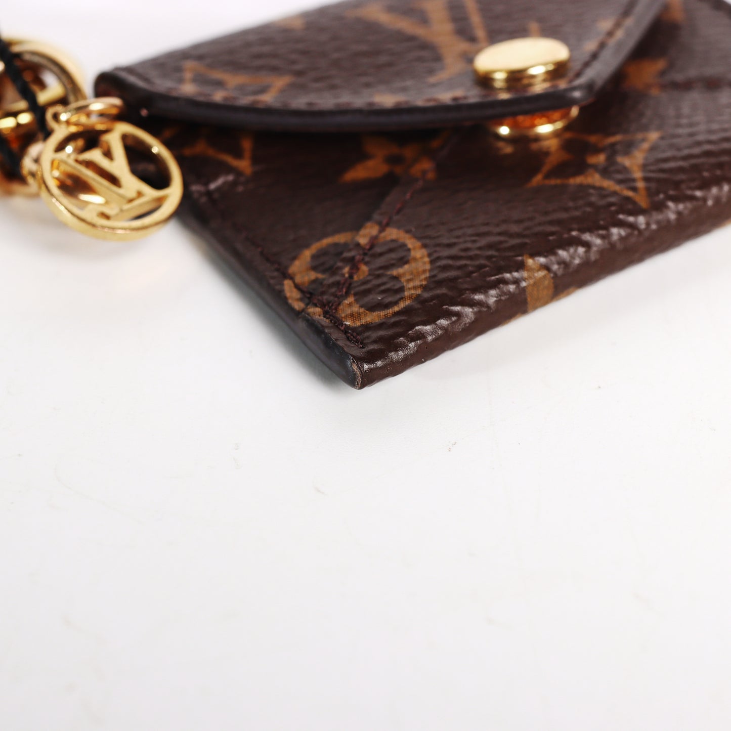 Pre-Owned Louis Vuitton Alma BB Monogram Brown Coated Canvas Crossbody Bag & Louis Vuitton Charm 80678499 & 66325671