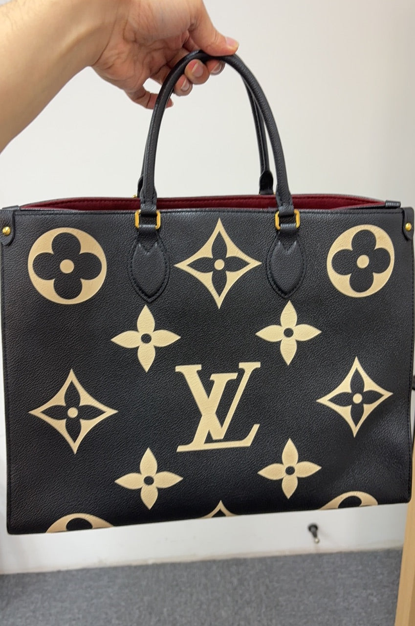 Pre-loved Louis Vuitton On The Go Emprented Monogram GM size